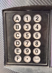 A detailed close-up view of the keyboard with numeric and alphanumeric buttons, ideal for various technical topics