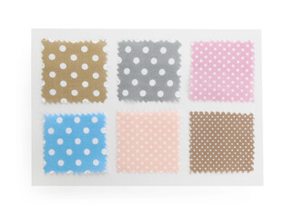 Samples of fabrics with polka dot pattern isolated on white, top view