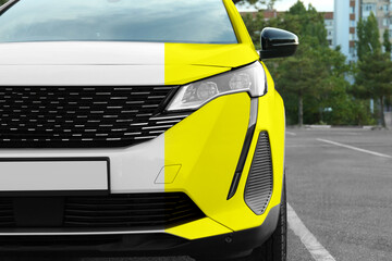 Modern white auto before and yellow after painting outdoors, closeup. Comparative collage of car...