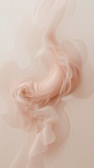 Abstract image of flowing fabric in light peach tones with soft focus and blurred motion effect