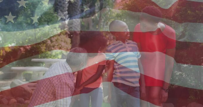 Family gathering in woods during flag raising starting bugle call guiding salute for education