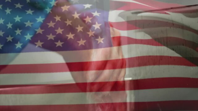 Right hand rotating faucet handle, hands rubbing soap lather, cleaning and rinsing under US flag
