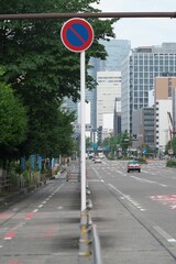 Nagoya, Japan - June 17, 2025: Bike Lane or bicycle path at Sakura-dori street in Nagoya, Japan