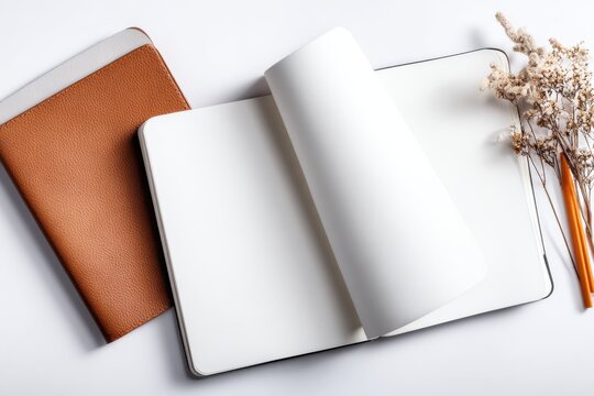 Open Blank Notebook With Leather Cover and Dried Flowers on White Background, Representing Creativity and Planning for Business Strategy : Generative AI