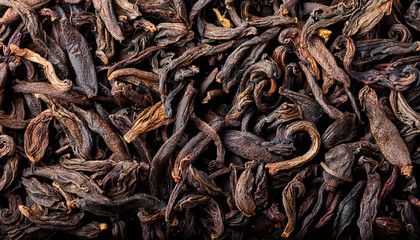 Fototapeta premium dried tea leaves closeup as background