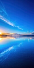 Fototapeta premium serene blue lake view at sunrise