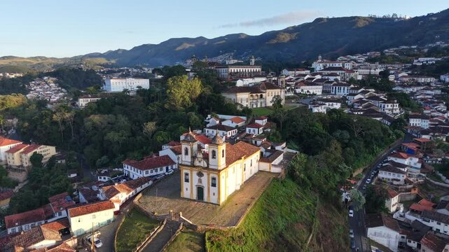 Aerial view of the historic center of Ouro Preto, Minas Gerais, Brazil - historic city founded in the 18th century during the Gold Cycle with houses of Portuguese colonial architecture and baroque chu