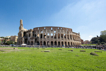 Viewpoint from the gardens of the Arch of Titus, of the Roman Colosseum, on a sunny day