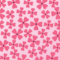 Floral wallpaper background in shades of pink.