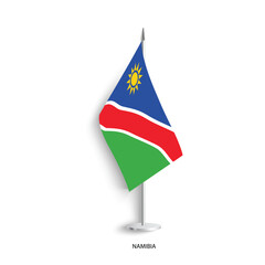 Namibia table flag on light grey background. Namibia desk flag isolated on grey background	
