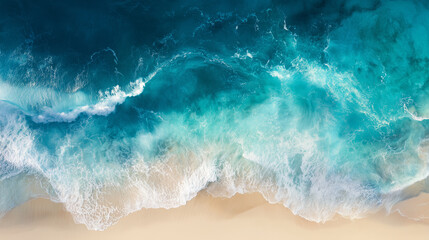 Aerial Top-Down View of Turquoise Ocean Waves Crashing on a Sandy Beach
