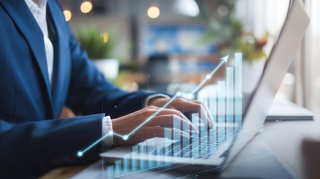 Growth analytics shown with computer user in blue suit for business plan