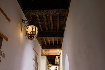 Scenic view of ornate architectural detail in Madrasa Ben Youssef mosque in the Old Town Medina area of Marrakech, west Morocco 