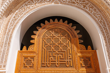Scenic view of ornate architectural detail in Madrasa Ben Youssef mosque in the Old Town Medina area of Marrakech, west Morocco 