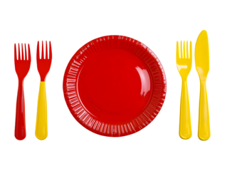 Vibrant disposable tableware arrangement featuring red plates and yellow cutlery on black background