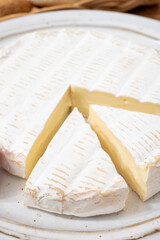 French soft cheeses collection, creamy cow's milk cheese brie with white mold, France