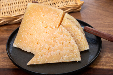 Very old anejo tostado Spanish hard cheese, cow and sheep curado, manchego, goat cheese close up