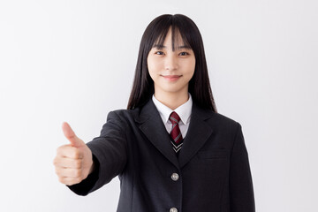グッドポーズをする女子高生
