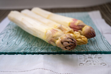 New season, fresh raw French violet-white asparagus vegetables large size, ripe and tasty