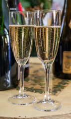 Pouring and tasting of dry sparkling wine brut, grand reserve, champagne in Ay-Champagne wine making village in Vallee de la Marne, , Champagne region, France