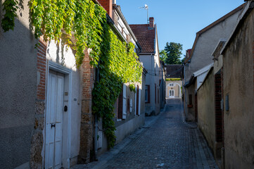 Narrow streets and old houses in grand cru champagne village Ay-Champagne in Marne river valley, France
