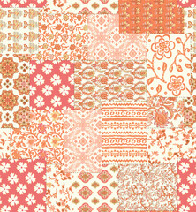 a patchwork pattern with orange and white flowers