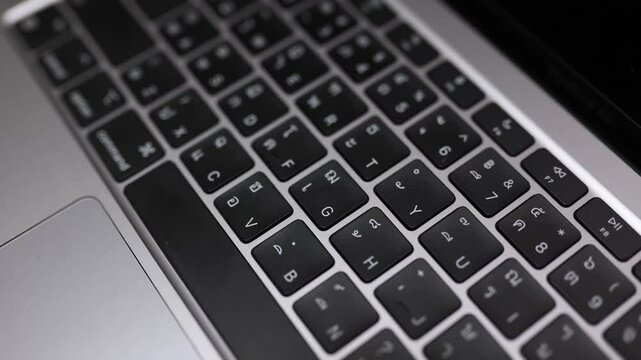 Closeup keypad laptop slow motion