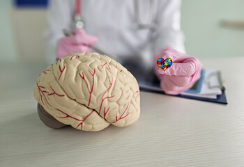 Brain with heart puzzle, autism awareness, autism spectrum disorder family support , world autism awareness day concept