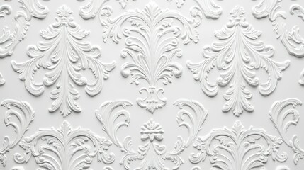 A white, ornate, decorative wall with intricate floral patterns and a white background.
