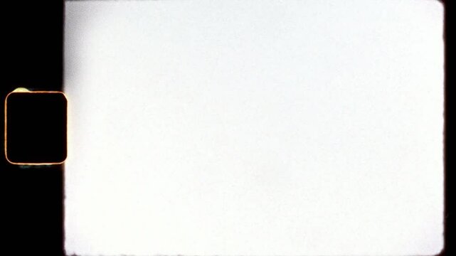 8mm Film Grain Overlay with Letterbox Frame, Super-8 Dust Scratches and Faded Texture Loop - Blend Mode Multiply Overlay