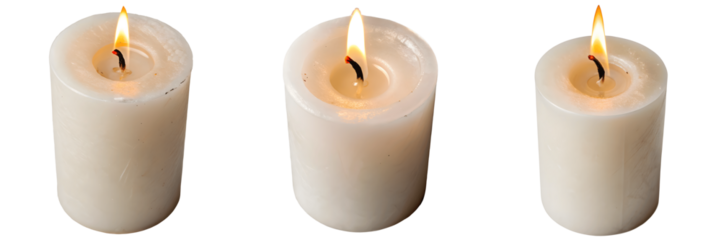 Three lit candles isolated on transparent background create a warm glow