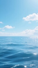 Obraz premium Calm Ocean Waters Under a Bright Blue Sky