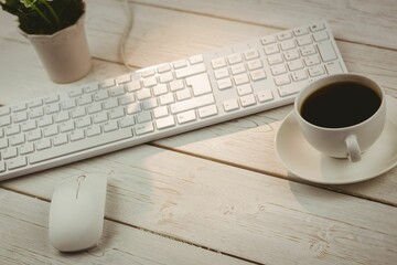 Keyboard with flower pot and coffee