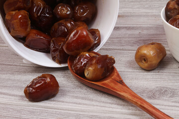dates in a wooden bowl
