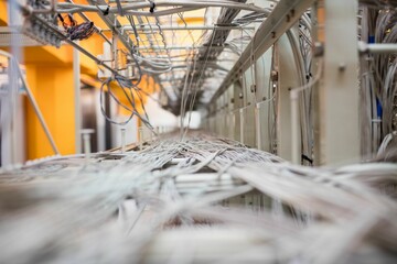 Network cables are routing through cable trays forming vanishing point corridor in flat design