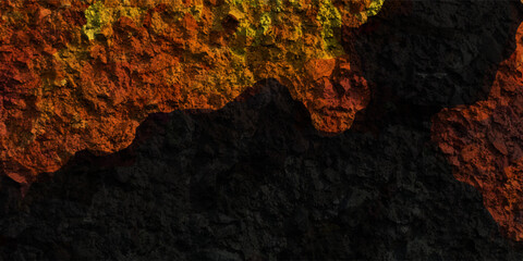 Mesmerizing view of a lava flow, red hot molten liquid streaming over black solid volcanic rocks, aerial directly above shot. Abstract, texture
