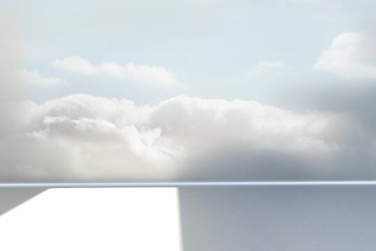 Fototapeta Bright rectangular light patch is reflecting on smooth grey floor under cloudy sky in flat design