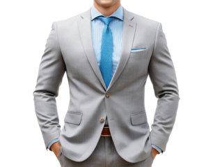 Gray Suit and Blue Tie: A well-dressed man stands confidently, hands in pockets, wearing a sharp gray suit and a light blue tie. His attire conveys professionalism, style, and success.