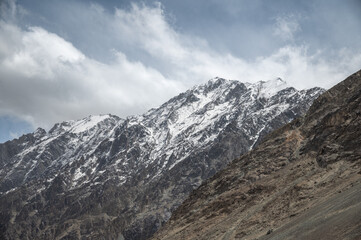 Majestic snow-covered Himalayan peak seen from Diskit Monastery in Nubra Valley, Ladakh — serene...