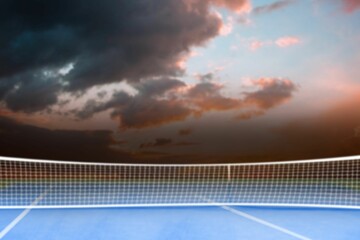 Facing view of net on tennis court