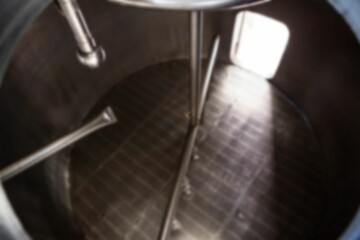 Overhead view of empty storage tank at factory