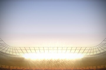Large football stadium under blue sky