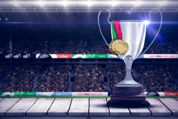Obraz premium Trophy with medals at illuminated stadium