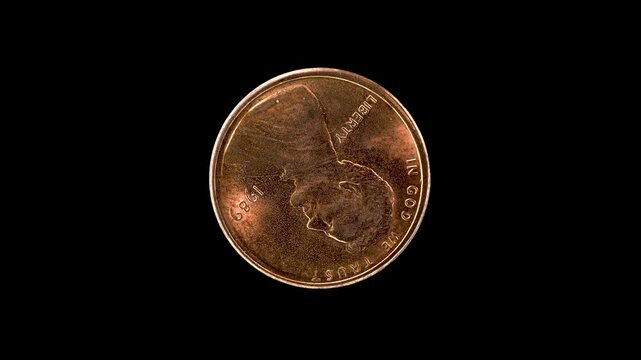 United States 1989 1 cent coin obverse with Abraham Lincoln portrait rotating on black background