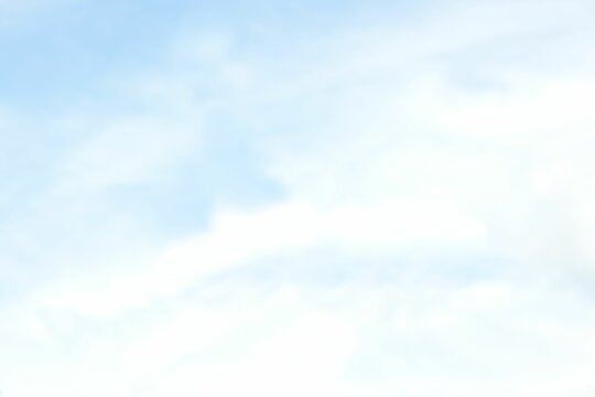 Fototapeta Flat design sky illustration is showing soft white clouds floating across pale blue background