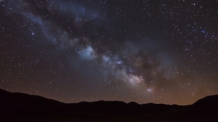 Timelapse of Milky Way with illuminated camping tent at night