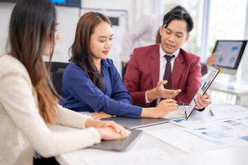 Fototapeta premium Business team analyzing financial data and discussing growth strategies