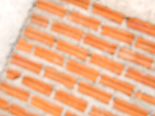 Blur old red brick wall texture vintage diagonal background, rustic urban exterior.