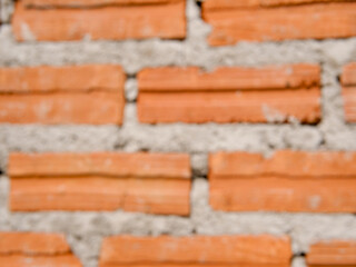 Blur old red brick wall texture vintage background, rustic urban exterior.