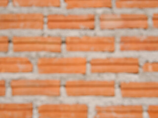Blur old red brick wall texture vintage background, rustic urban exterior.